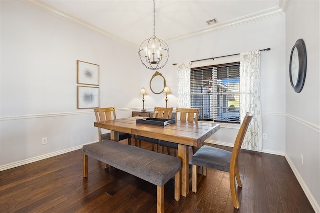 dining area featuring a chandelier, baseboards, visible vents, and ornamental molding
