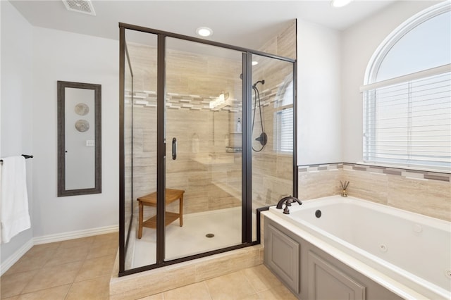 705 SW Maidstone Ave, Bentonville, AR 72712 - full bathroom with a whirlpool tub, a stall shower, tile patterned floors, baseboards, and recessed lighting