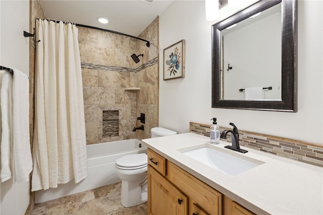 705 SW Maidstone Ave, Bentonville, AR 72712 - bathroom with toilet, vanity, shower / tub combo, and tasteful backsplash