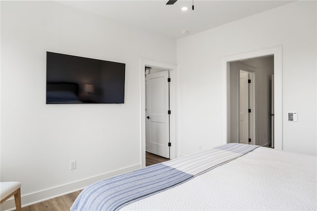 bedroom featuring recessed lighting, baseboards, a ceiling fan, and wood finished floors