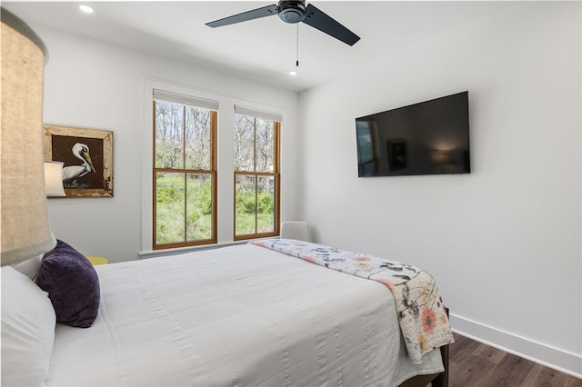 bedroom featuring recessed lighting, dark wood-style floors, baseboards, and a ceiling fan