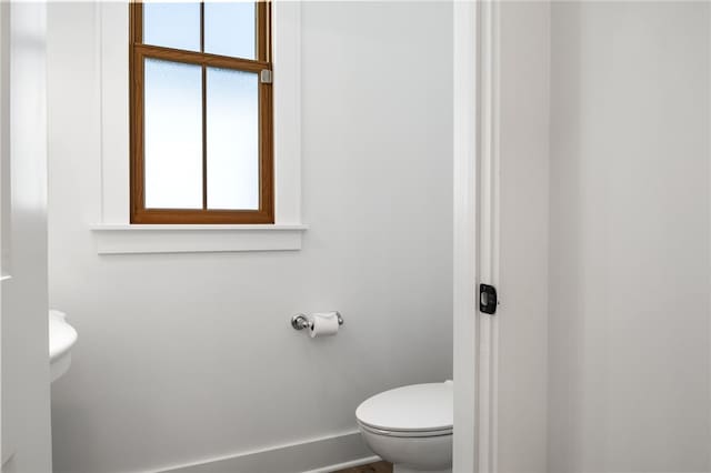 bathroom featuring toilet