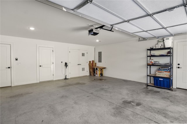 garage with electric panel, recessed lighting, baseboards, and a garage door opener