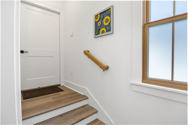 stairs with baseboards