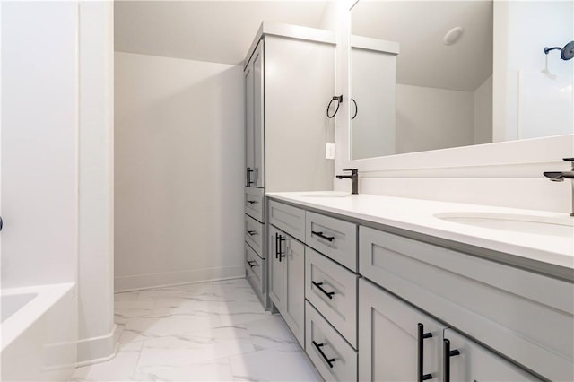 bathroom with marble finish flooring, double vanity, a tub, a shower, and baseboards