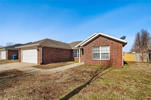 ranch-style home featuring driveway, a front lawn, brick siding, a garage, and fence