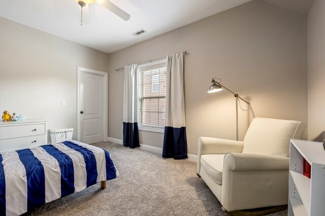 bedroom featuring carpet, baseboards, and a ceiling fan
