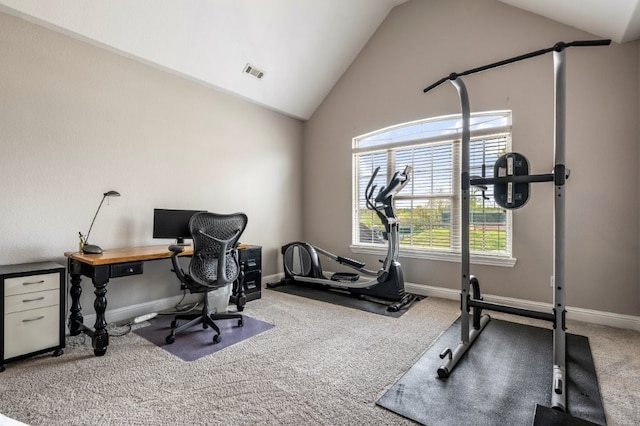 home office with carpet flooring, vaulted ceiling, and baseboards