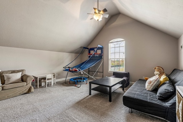 playroom featuring vaulted ceiling, a ceiling fan, carpet, and baseboards