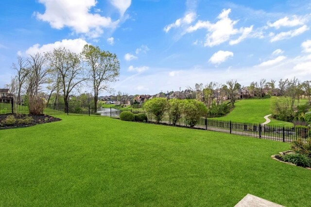 view of yard featuring a residential view
