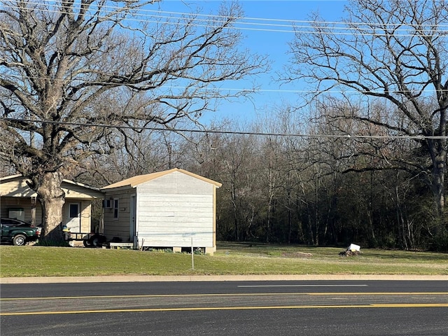 2304 E J St, Russellville, AR 72802 - view of property exterior with a lawn
