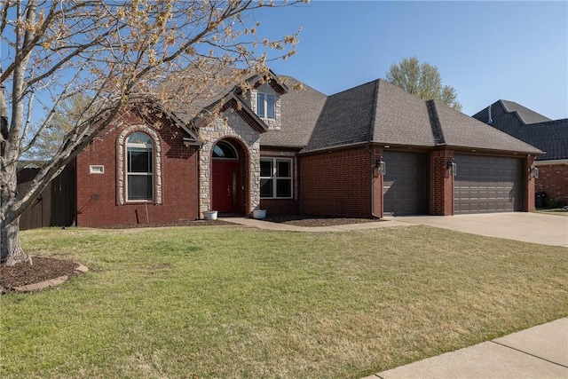 traditional home featuring a shingled roof, a garage, concrete driveway, brick siding, and a front lawn
