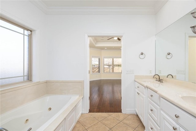 full bathroom with a sink, crown molding, a whirlpool tub, double vanity, and tile patterned flooring