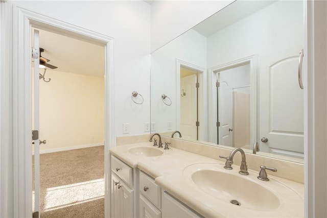 bathroom with double vanity and a sink