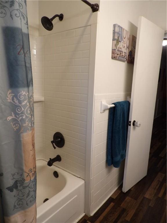 701 Crossbow Rd, Huntsville, AR 72740 - bathroom with wood finished floors and shower / bath combo with shower curtain