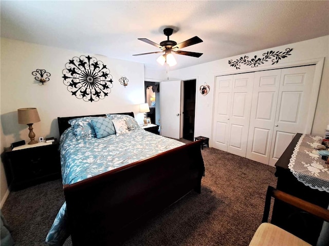 701 Crossbow Rd, Huntsville, AR 72740 - bedroom featuring dark colored carpet, a closet, and a ceiling fan