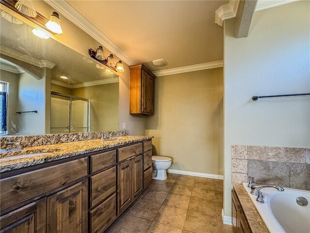 bathroom with a bath, ornamental molding, a shower stall, and double vanity