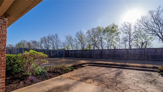 view of patio featuring a fenced backyard