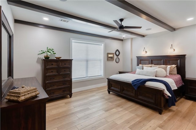 bedroom with beamed ceiling, light wood-type flooring, visible vents, recessed lighting, and baseboards