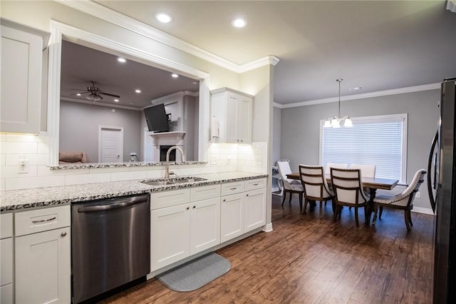 kitchen with dark wood-style floors, white cabinetry, freestanding refrigerator, dishwasher, and a sink