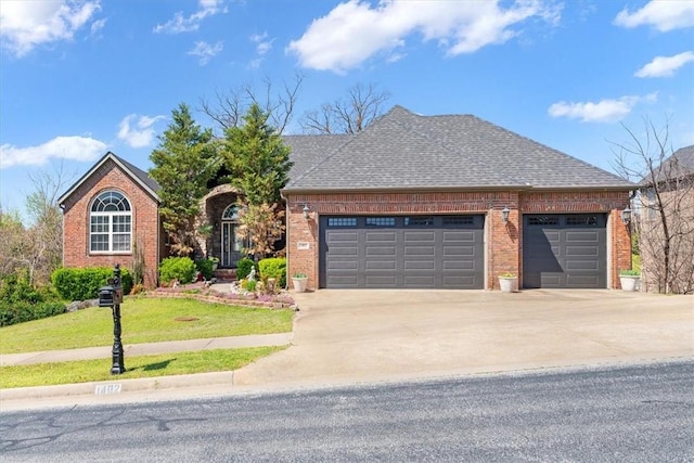 1402 NE Fairwinds Dr, Bentonville, AR 72712 - single story home featuring an attached garage, concrete driveway, a front lawn, and brick siding