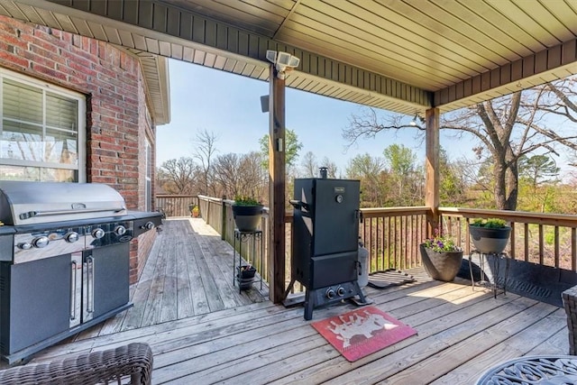 1402 NE Fairwinds Dr, Bentonville, AR 72712 - wooden deck with a grill
