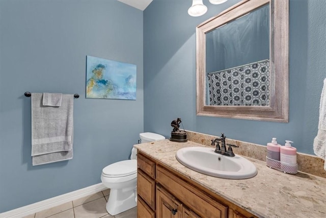 1402 NE Fairwinds Dr, Bentonville, AR 72712 - bathroom featuring tile patterned floors, vanity, baseboards, and toilet