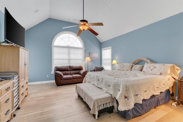 1402 NE Fairwinds Dr, Bentonville, AR 72712 - bedroom featuring ceiling fan, light wood-type flooring, and lofted ceiling