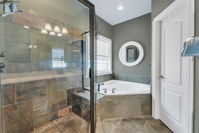 1402 NE Fairwinds Dr, Bentonville, AR 72712 - bathroom with a bath, marble finish floor, and a stall shower