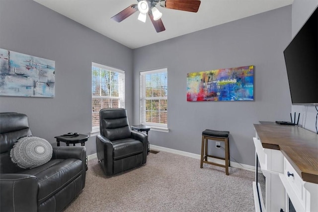 1402 NE Fairwinds Dr, Bentonville, AR 72712 - sitting room with light carpet, baseboards, and ceiling fan