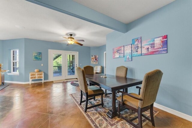 1402 NE Fairwinds Dr, Bentonville, AR 72712 - tiled dining area with french doors, ceiling fan, and baseboards