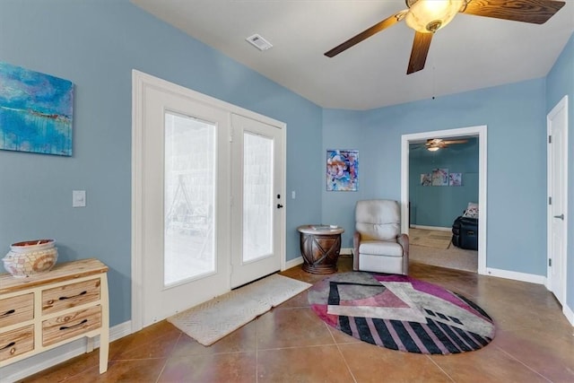 1402 NE Fairwinds Dr, Bentonville, AR 72712 - sitting room featuring tile patterned floors, baseboards, a ceiling fan, and visible vents