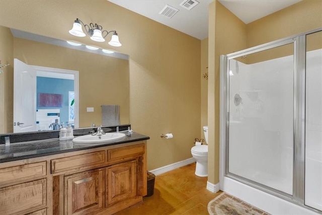 1402 NE Fairwinds Dr, Bentonville, AR 72712 - bathroom with a shower stall, visible vents, and toilet