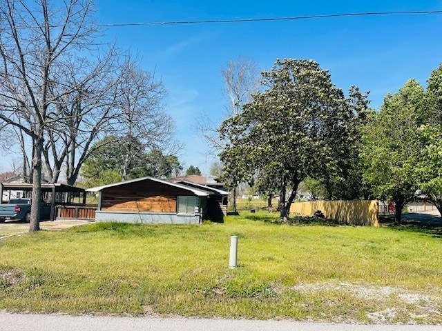 exterior space with a yard