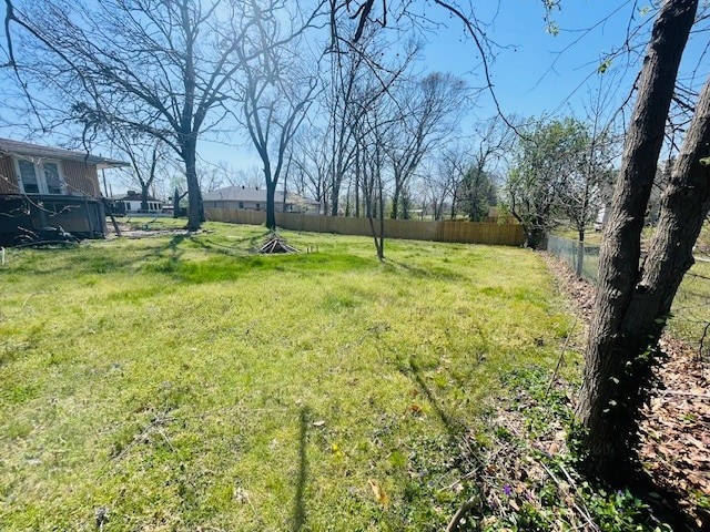 view of yard with fence