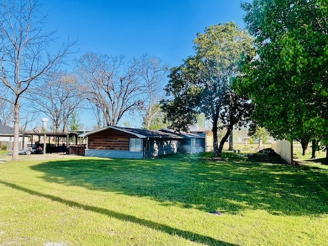 view of yard featuring a carport