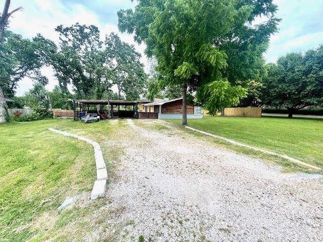 1110 NW 7th St, Bentonville, AR 72712 - view of front of property featuring driveway and a detached carport