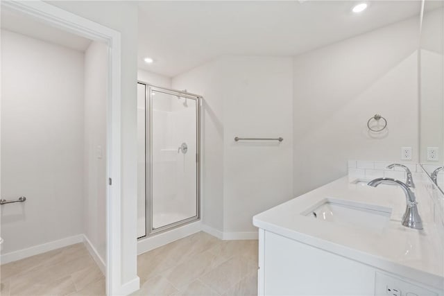 3 Islay Ln, Bella Vista, AR 72715 - bathroom featuring a shower stall, double vanity, and recessed lighting