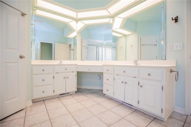 full bathroom featuring vanity, baseboards, tile patterned flooring, and visible vents