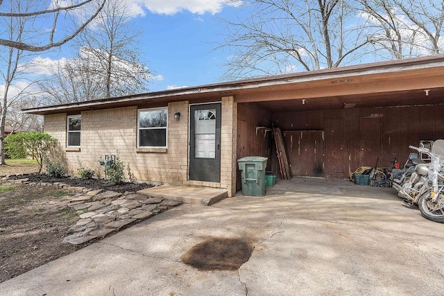 exterior space with a carport