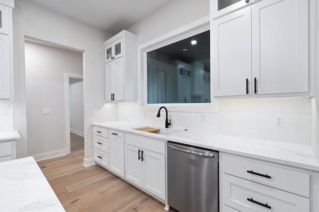 17153 Mill Hill Rd, Garfield, AR 72732 - kitchen featuring backsplash, light wood-type flooring, dishwasher, a sink, and white cabinetry