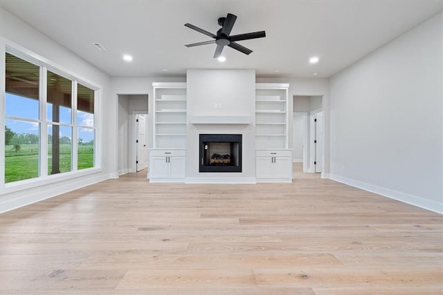 17153 Mill Hill Rd, Garfield, AR 72732 - unfurnished living room with baseboards, recessed lighting, light wood finished floors, and a fireplace