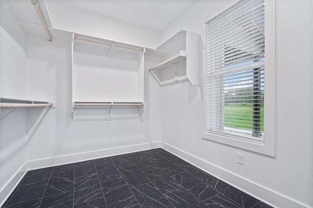 17153 Mill Hill Rd, Garfield, AR 72732 - walk in closet featuring marble finish floor