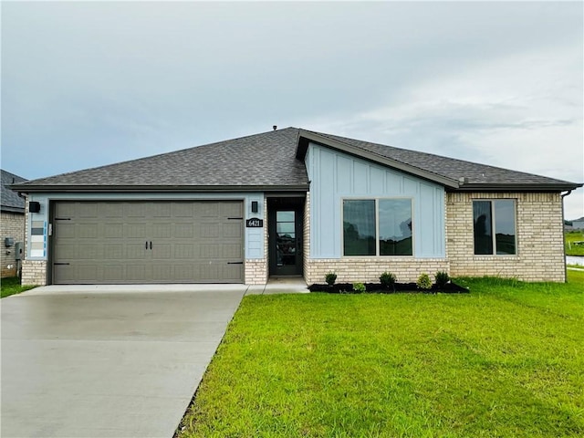 6405 NW Harley St, Bentonville, AR 72713 - view of front of property with a garage, driveway, board and batten siding, a front lawn, and a shingled roof