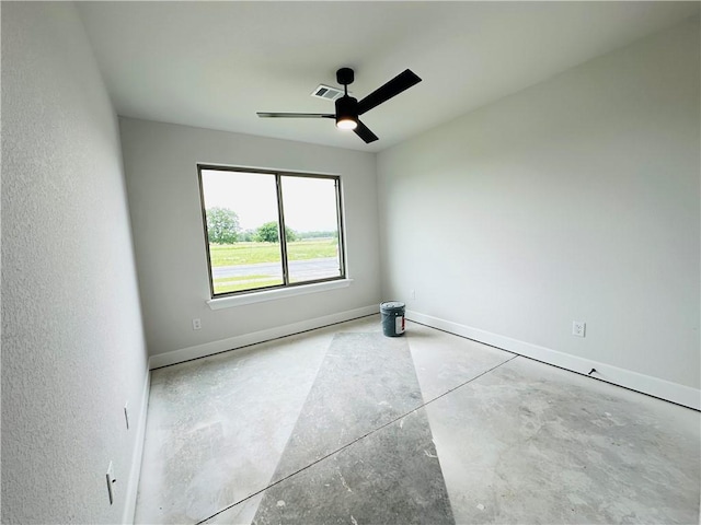 6405 NW Harley St, Bentonville, AR 72713 - empty room featuring concrete floors and ceiling fan