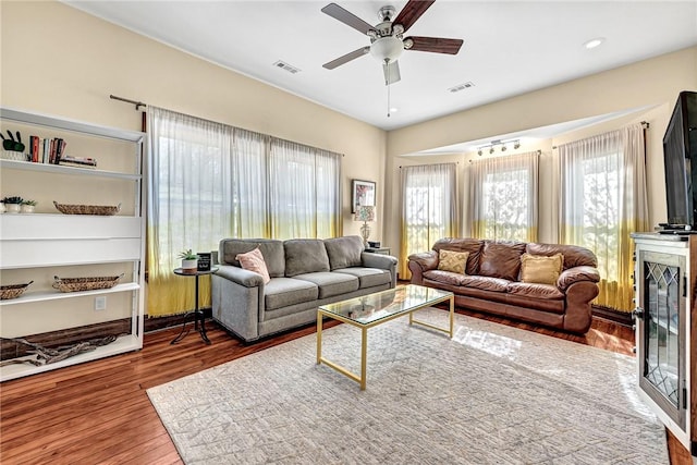 10093 Oklahoma Dr, Rogers, AR 72758 - living room featuring visible vents, wood finished floors, and ceiling fan