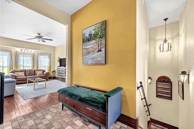 10093 Oklahoma Dr, Rogers, AR 72758 - living area featuring ceiling fan and baseboards