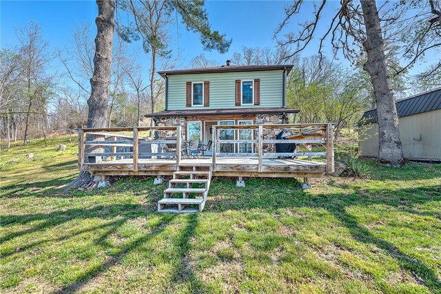 10093 Oklahoma Dr, Rogers, AR 72758 - rear view of property featuring a yard and a wooden deck