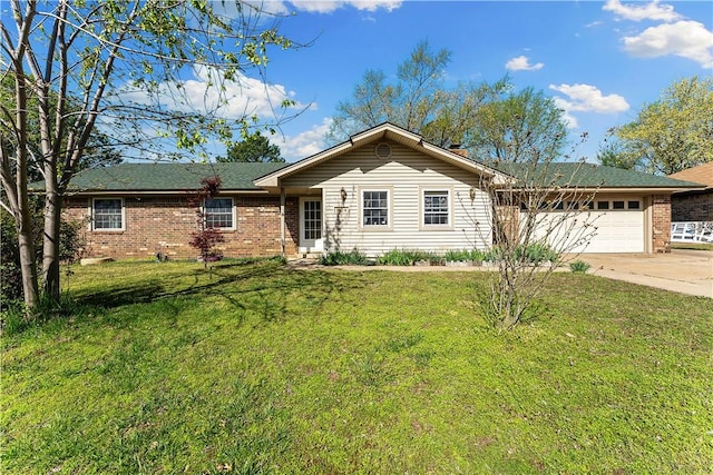 304 Angela St, Springdale, AR 72762 - ranch-style home featuring a front yard, brick siding, driveway, and an attached garage