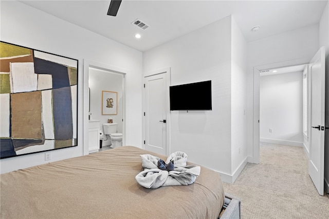 unfurnished bedroom with baseboards, recessed lighting, carpet flooring, ensuite bath, and visible vents